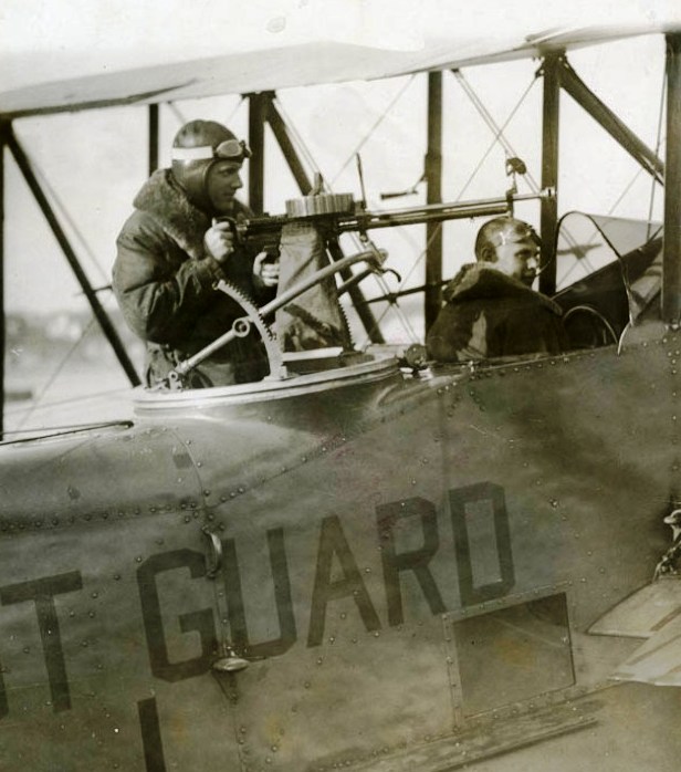 Close-up of an OL-5 cockpit with an air-cooled machine gun mounted aft for aerial use of force and law enforcement interdiction. (U.S. Coast Guard) Close-up of an OL-5 cockpit with an air-cooled machine gun mounted aft for aerial use of force and law enforcement interdiction. (U.S. Coast Guard)